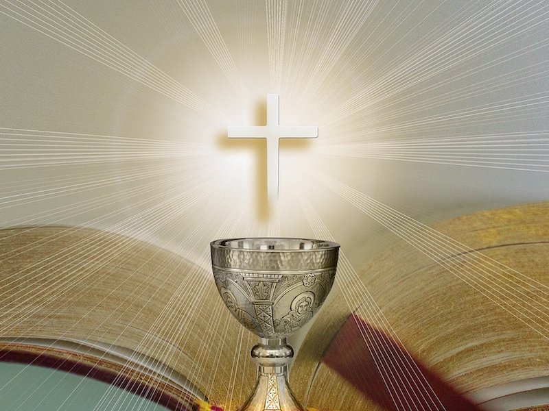Sinnbild Kreuz über Kelch